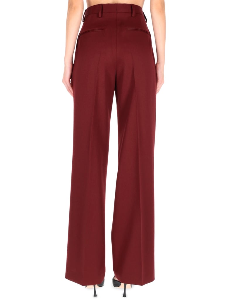 wool trousers in bordeaux by Selfnex
