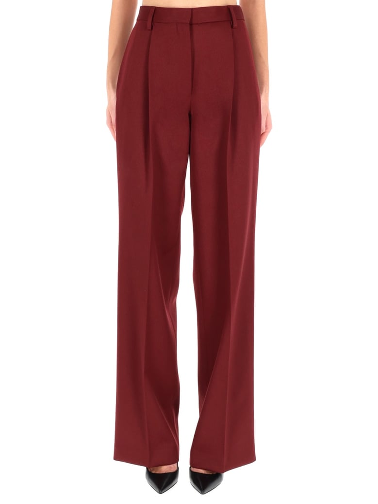 wool trousers in bordeaux by Selfnex
