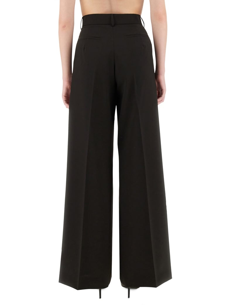 wide leg pants in brown by Selfnex