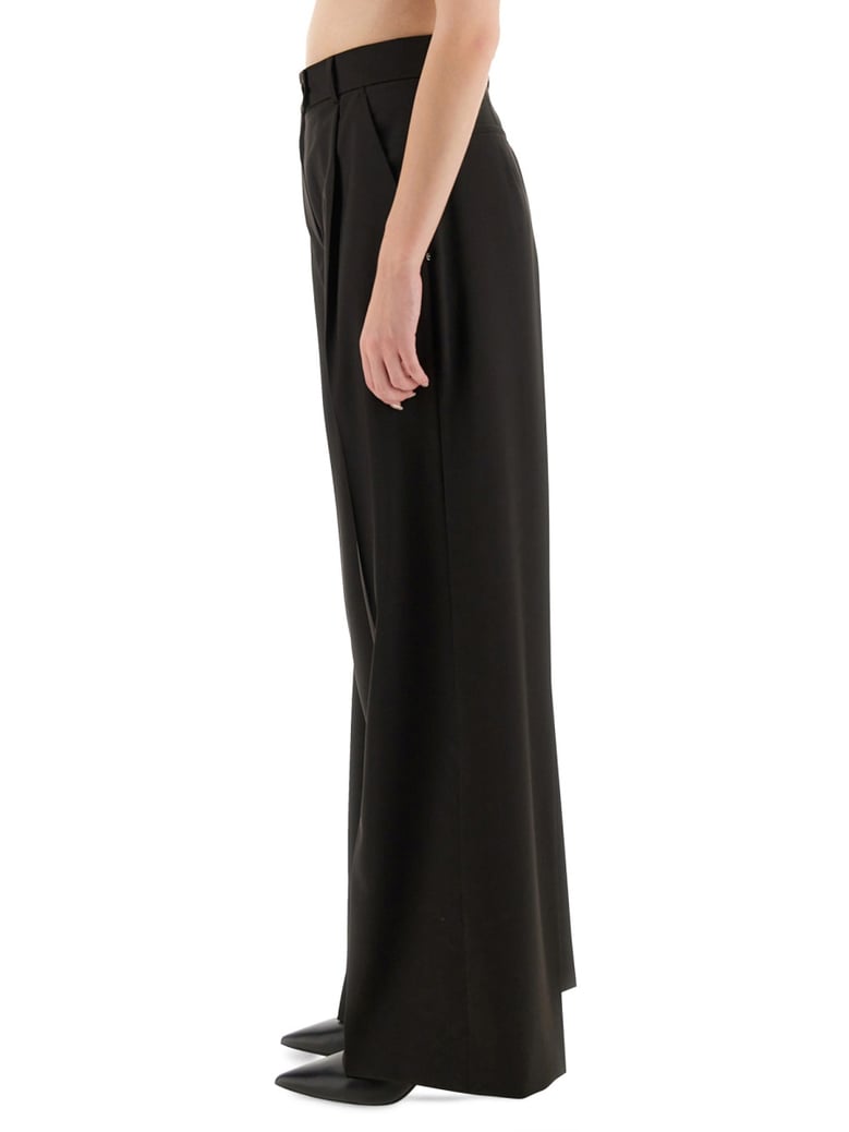 wide leg pants in brown by Selfnex