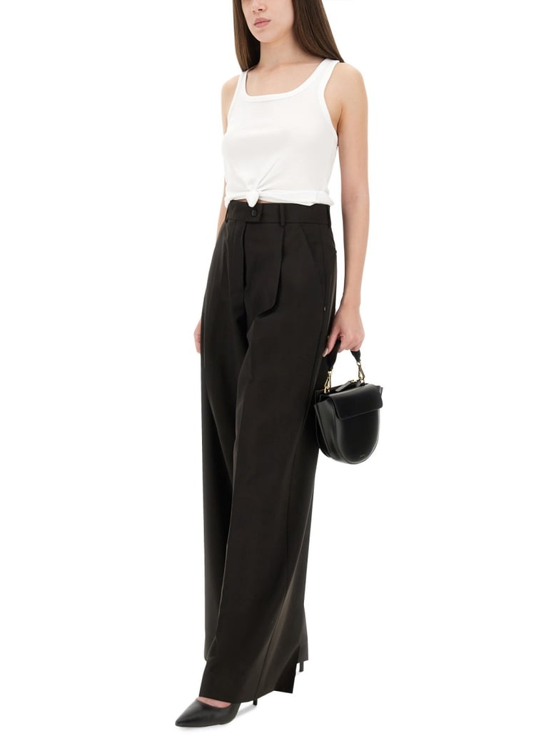 wide leg pants in brown by Selfnex