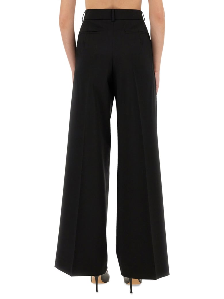pants in black virgin wool by Selfnex