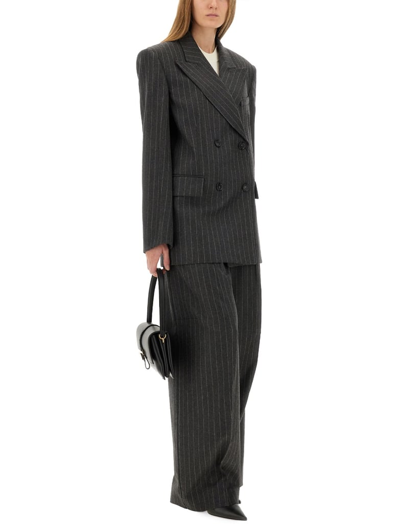 wide leg pants in charcoal by Selfnex