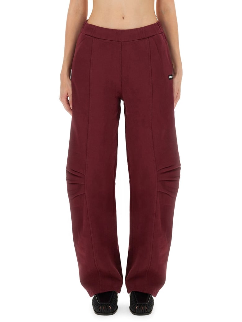relaxed fit sports pants in bordeaux by Selfnex