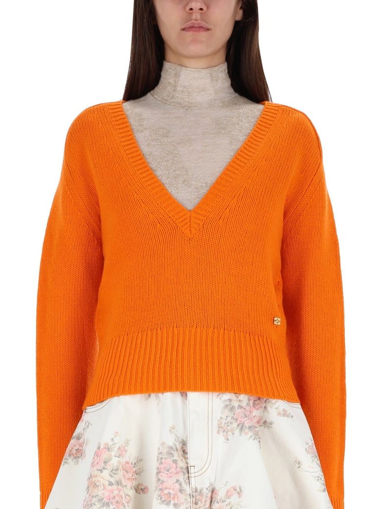 cashmere sweater in orange by Selfnex