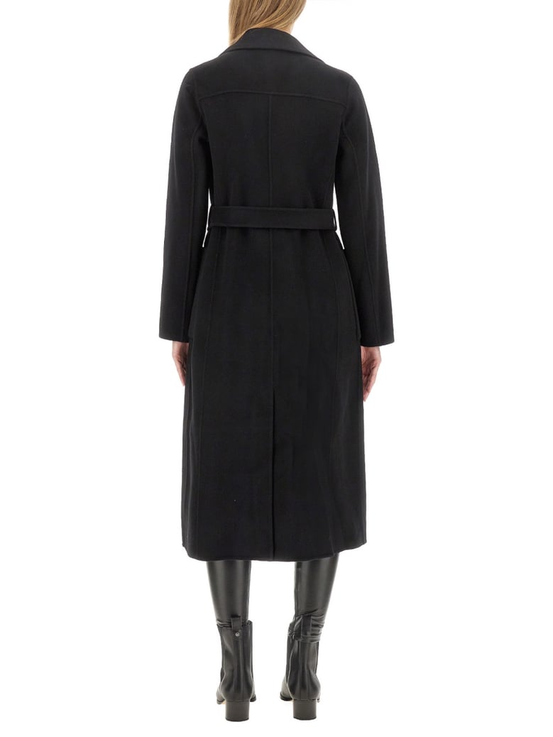 belted coat in black by Selfnex