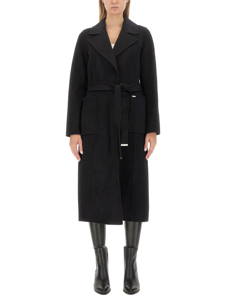 belted coat in black by Selfnex