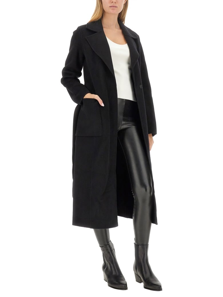 belted coat in black by Selfnex