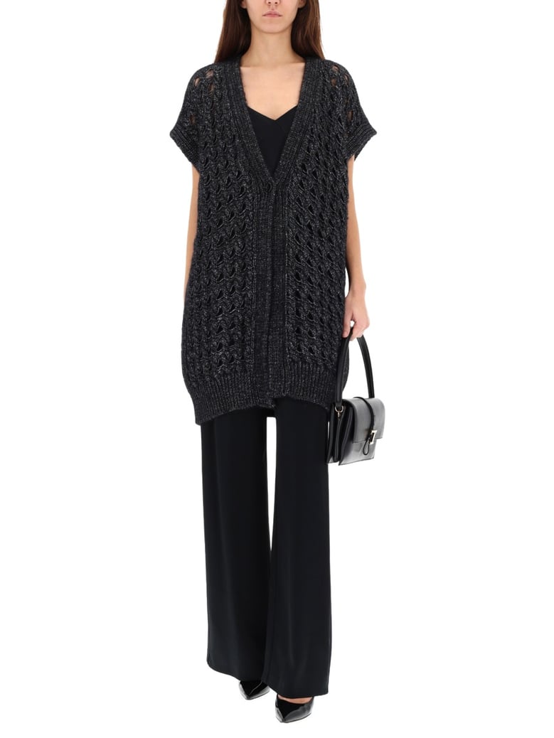black vest with perforated workmanship by Selfnex