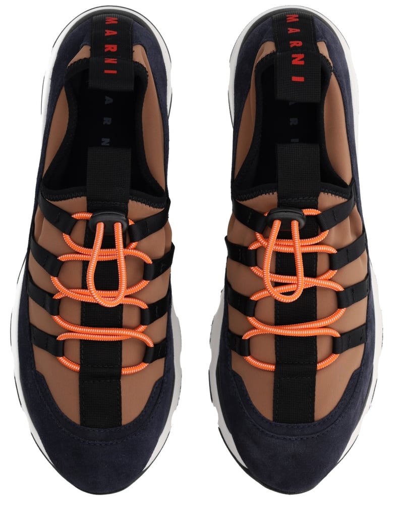 running sneaker in brown by Selfnex