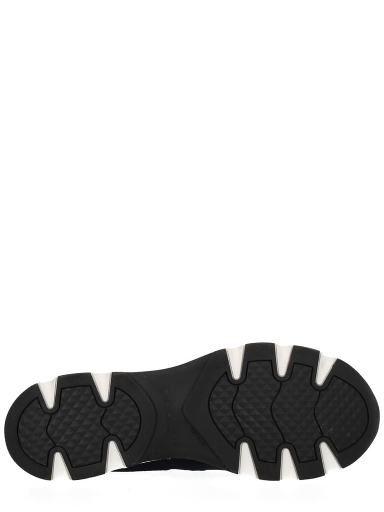 running sneaker in brown by Selfnex