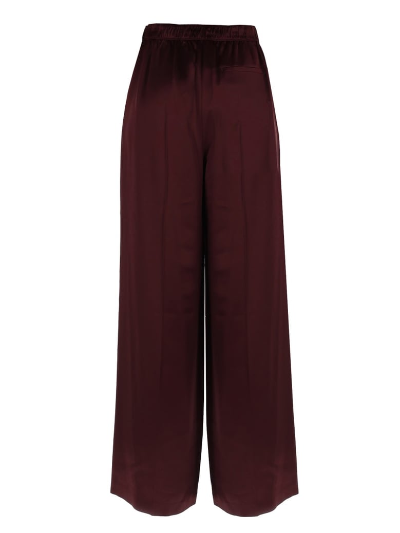 tailored pants in bordeaux by Selfnex