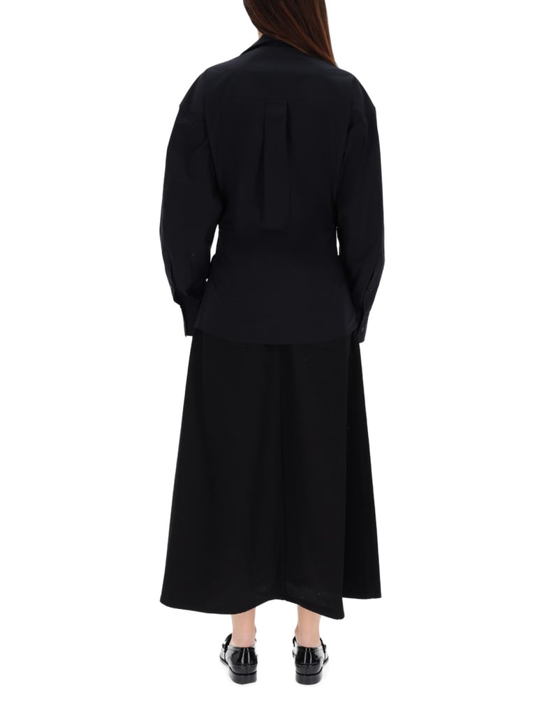 long wrap dress in black by Selfnex