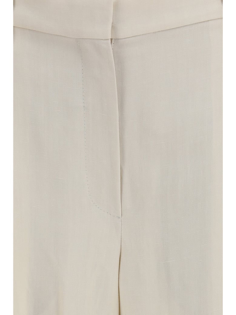 wide trousers in fluid twill by Selfnex