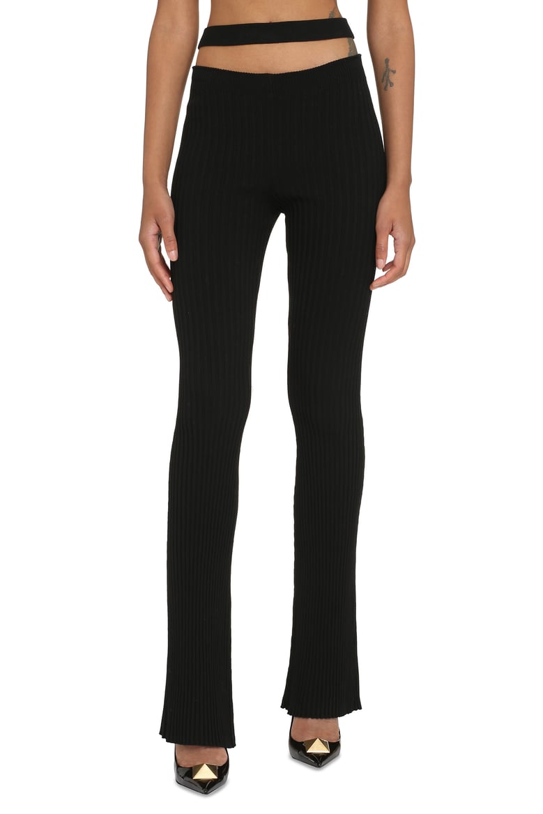 ribbed knit flared trousers by Selfnex