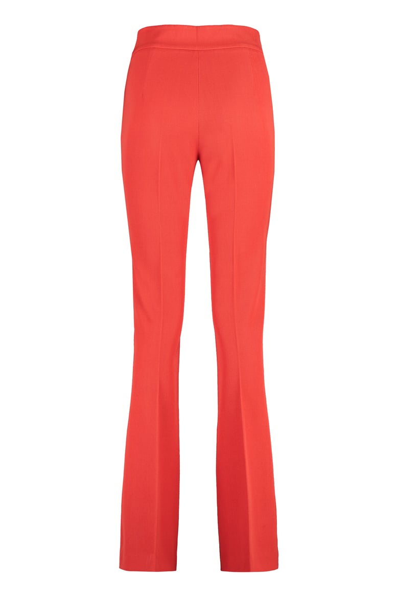coral flared trousers by Selfnex