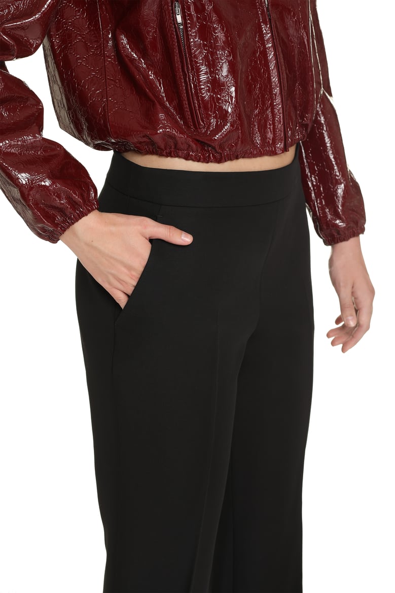 wool flared trousers by Selfnex