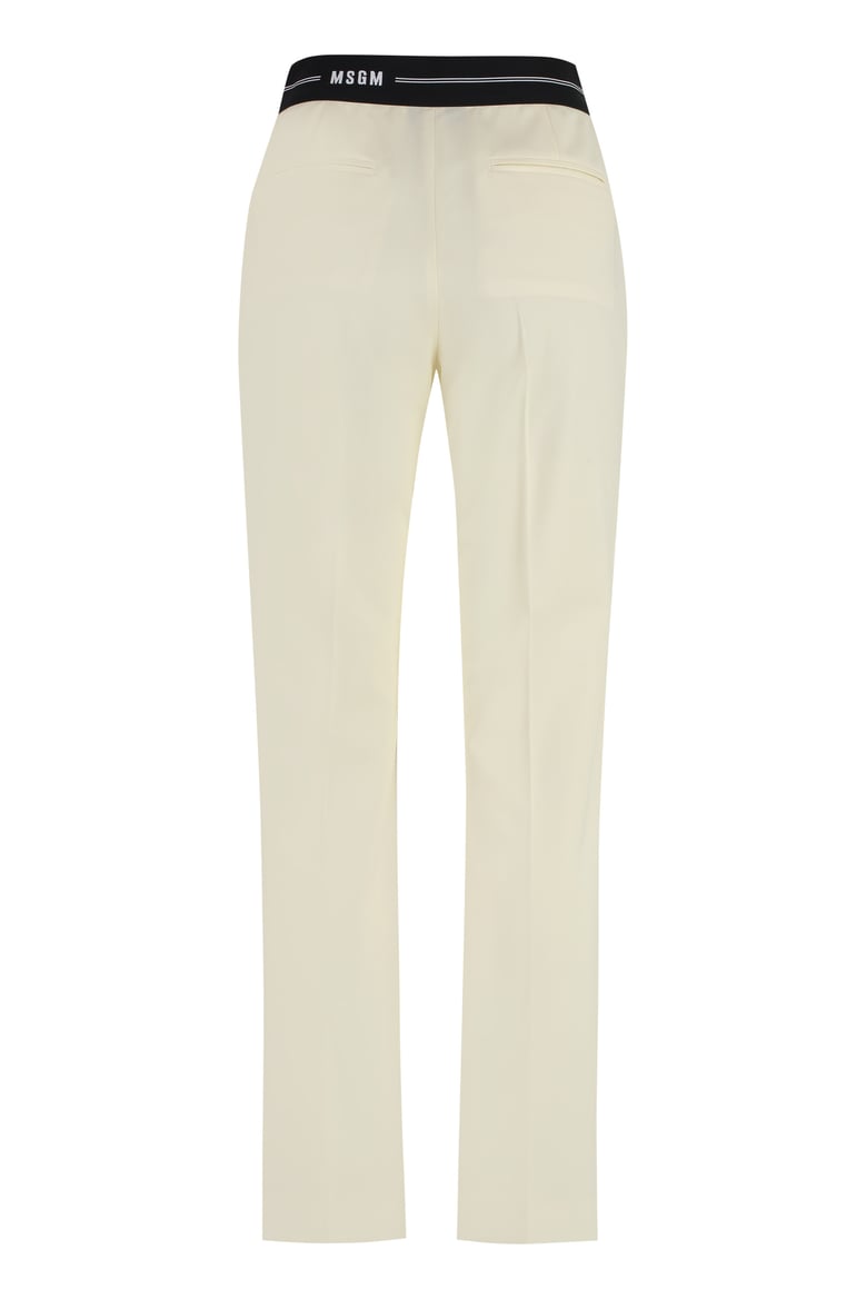 wool trousers in ivory by Selfnex