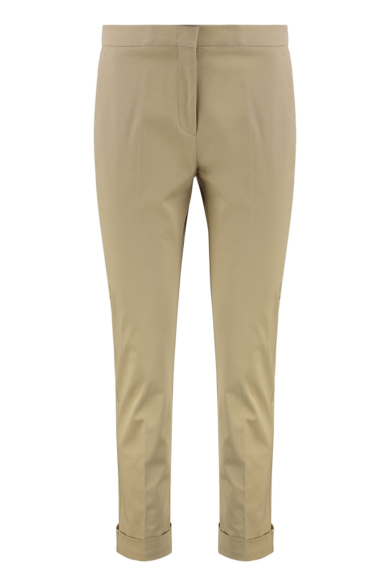 beige cropped trousers by Selfnex
