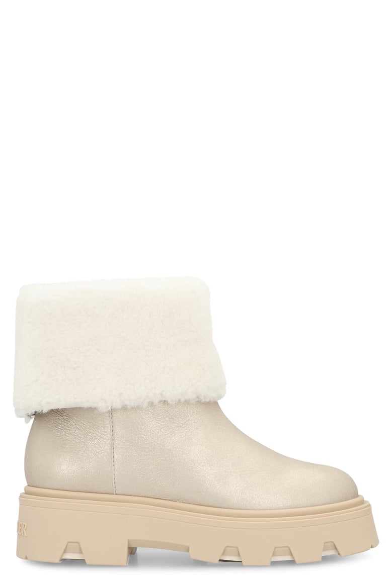 shearling boots in silver by Selfnex