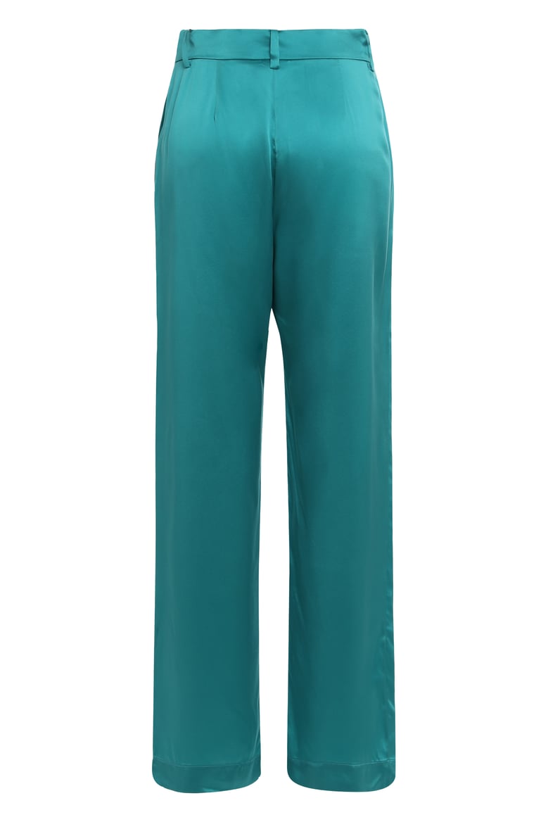 loose silk pants in turquoise by Selfnex