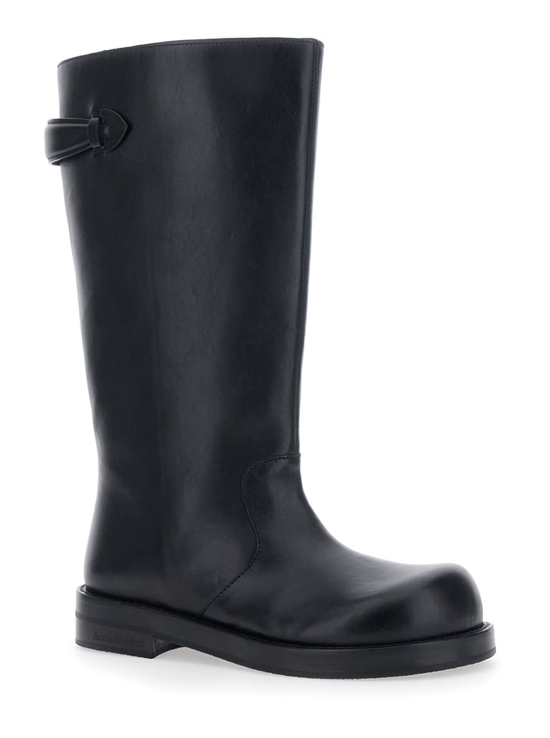 black leather boots with embossed logo by Selfnex