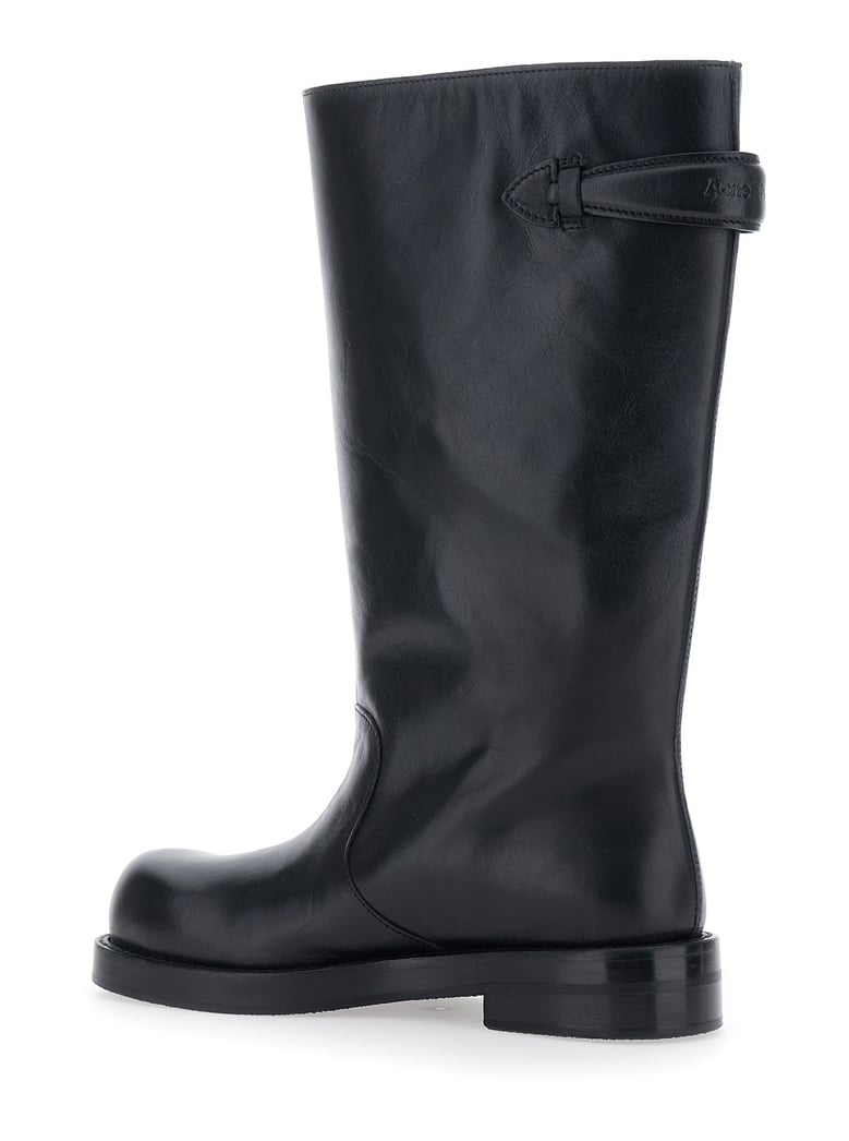 black leather boots with embossed logo by Selfnex