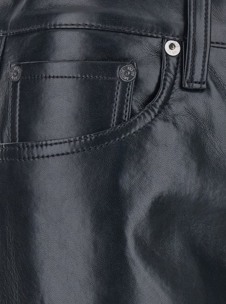 black pants with belt loops in leather blend by Selfnex