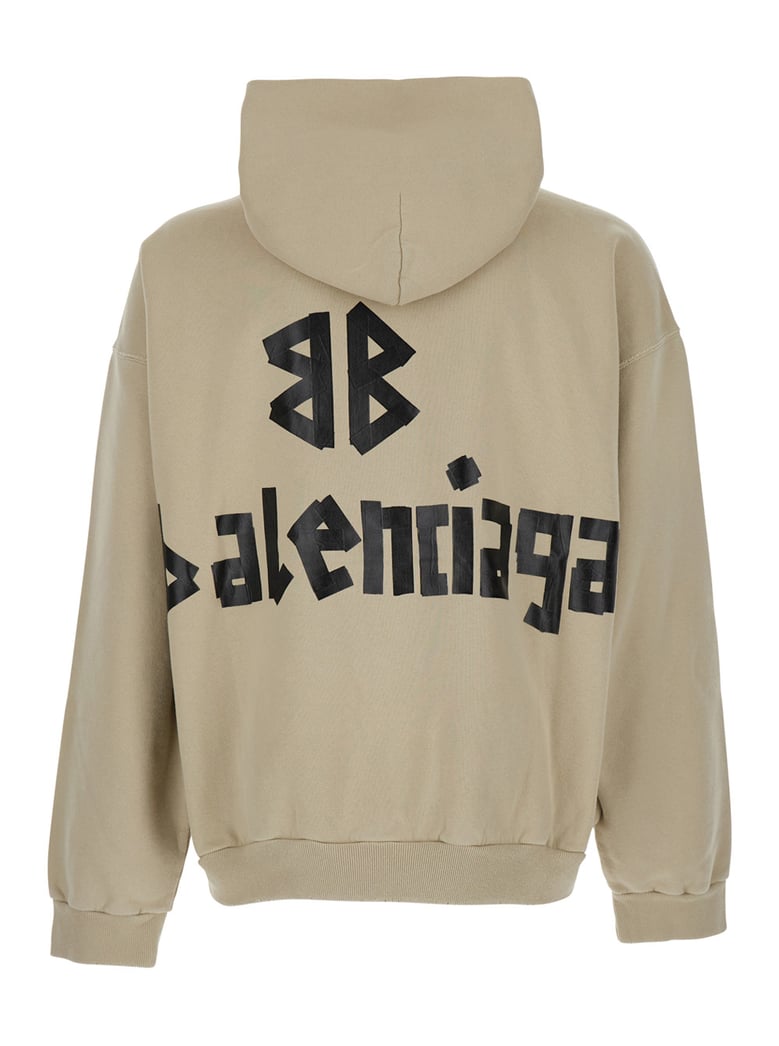 beige hoodie with logo lettering by Selfnex