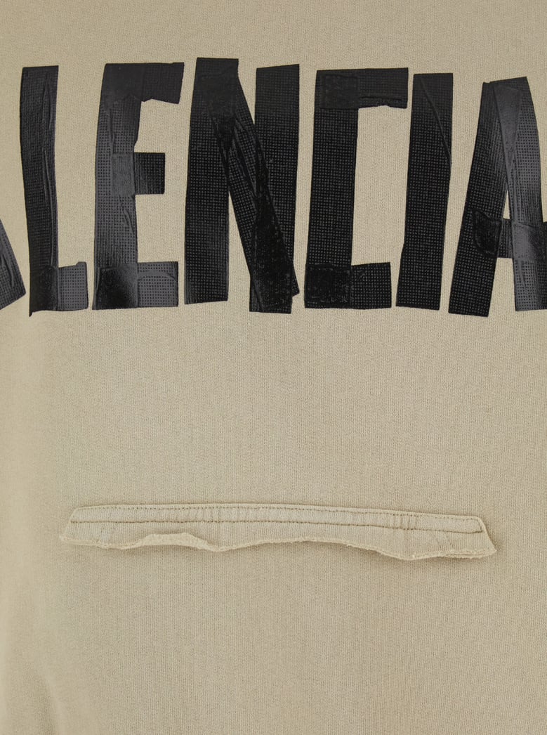 beige hoodie with logo lettering by Selfnex