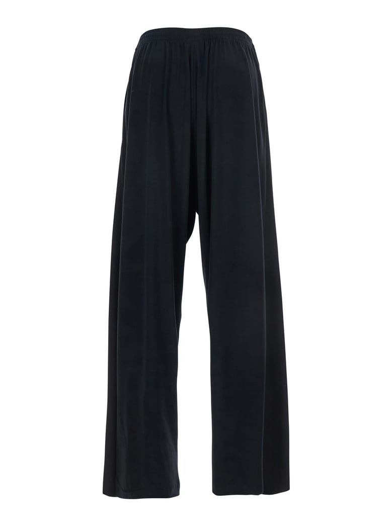 black wool pants with elastic waist by Selfnex