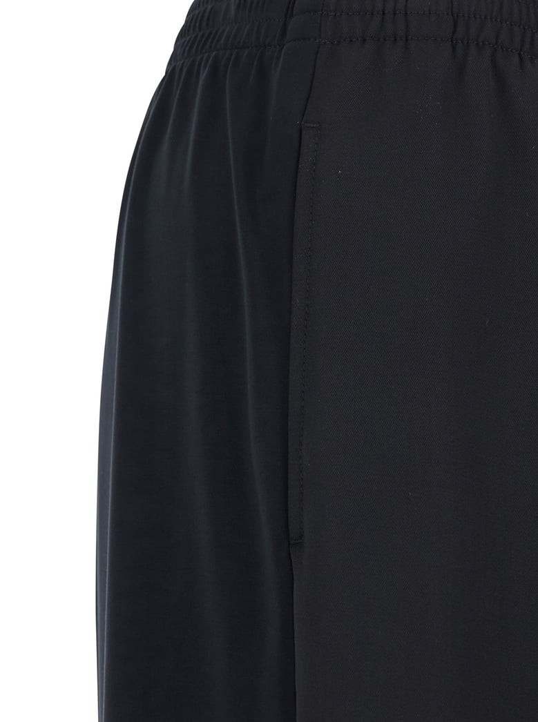 black wool pants with elastic waist by Selfnex