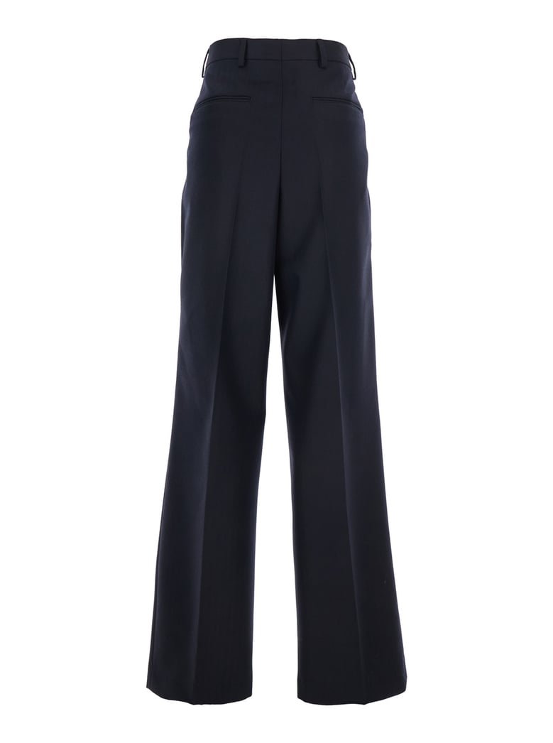 blue wide leg wool pants with pockets by Selfnex