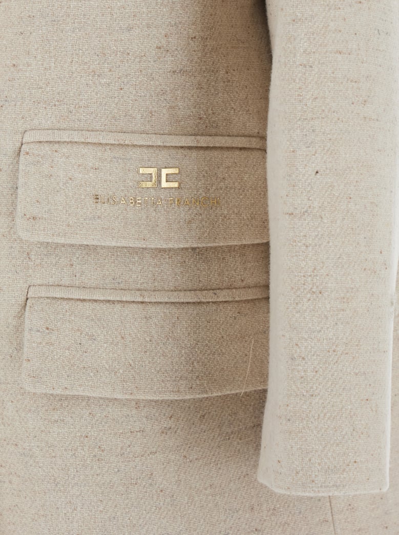 white coat with wide lapels by Selfnex