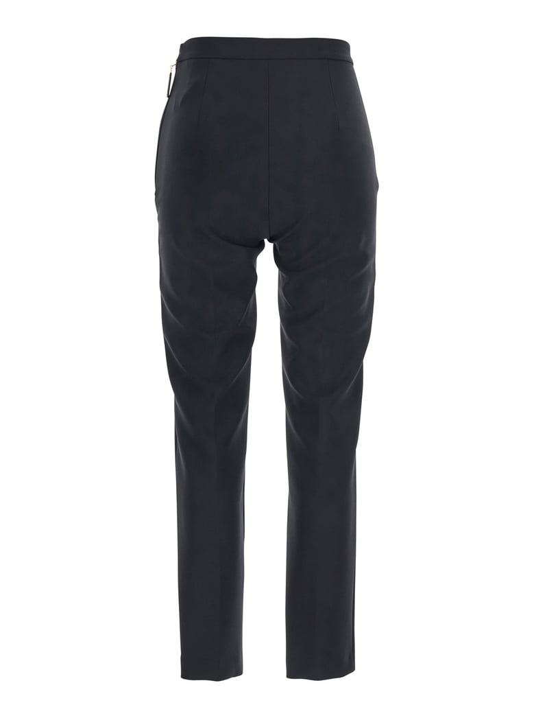 black trousers with flap pockets by Selfnex