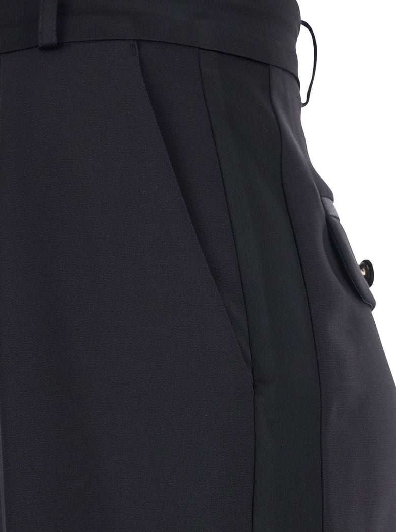 black trousers with pleated details by Selfnex