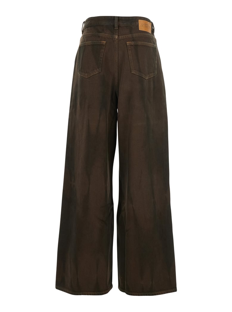 brown tie-dye patterned jeans by Selfnex