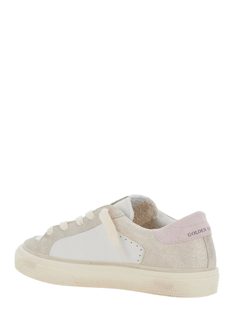 white low top sneakers with logo and star detail by Selfnex