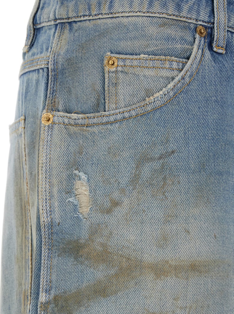 light blue jeans with ripped details by Selfnex