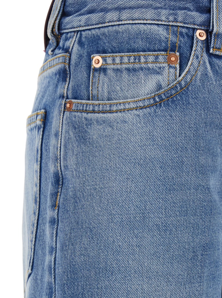 blue jeans with logo patch and faded effect by Selfnex