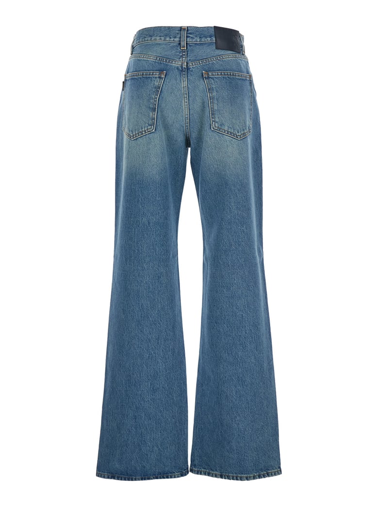 blue wide leg jeans with logo patch by Selfnex