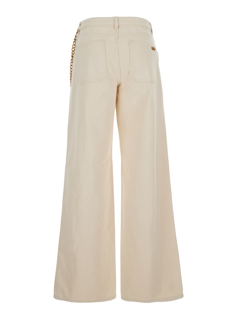 beige wide leg jeans with chain detail by Selfnex