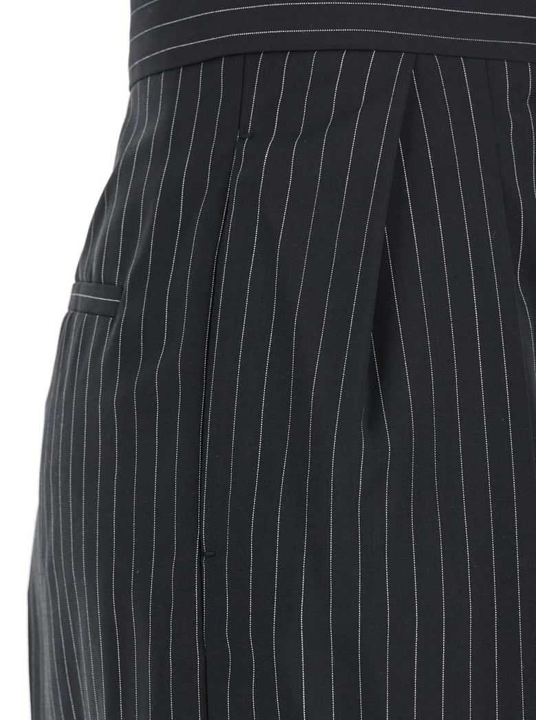 black pants with concealed closure and stripes by Selfnex