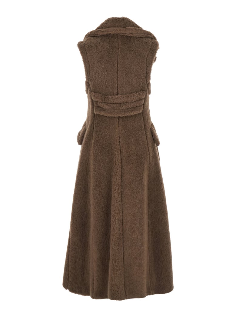 brown sleeveless coat with wide lapels by Selfnex
