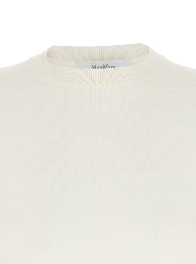 white crewneck wool sweater with short sleeves by Selfnex