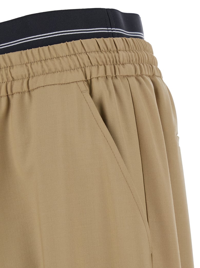 beige pants with elastic drawstring waist by Selfnex