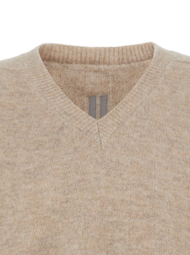 beige wool blend v neck sweater by Selfnex