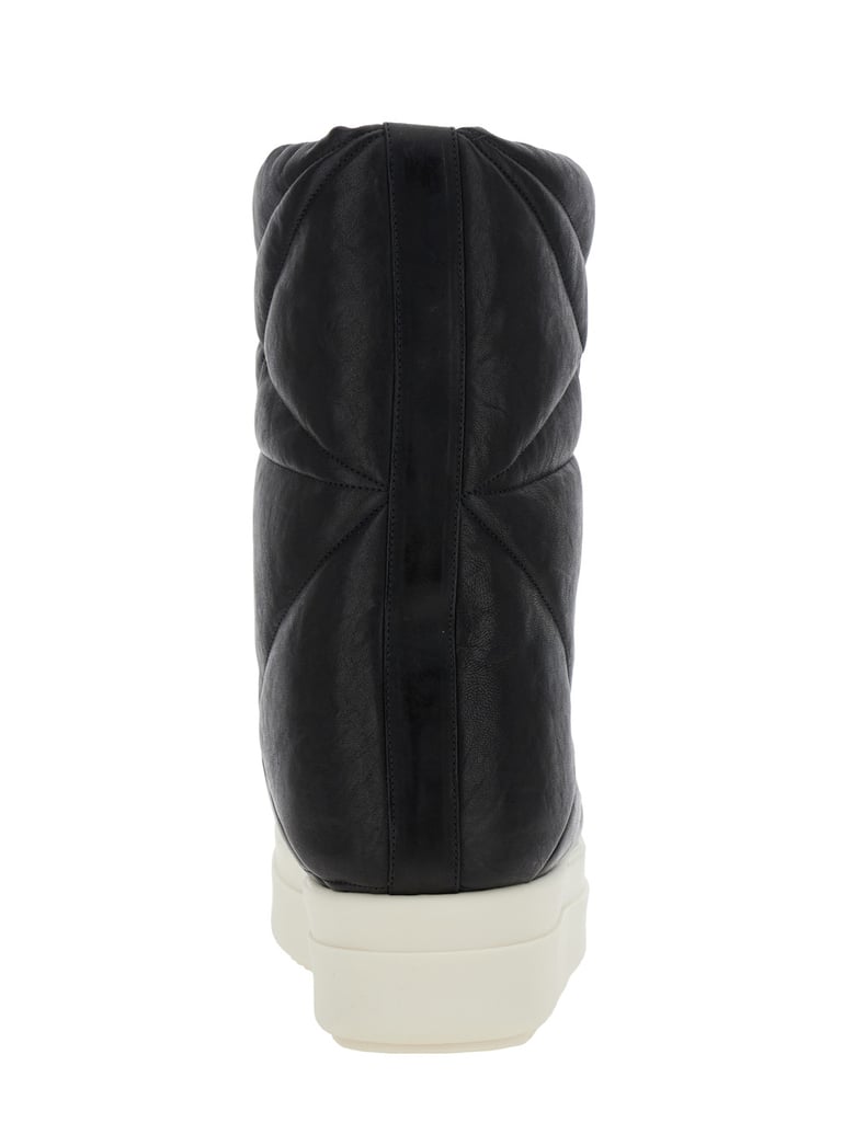 black down filled quilted ankle boots by Selfnex