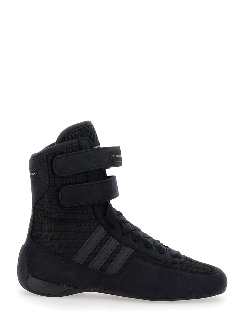 black sneakers with strap closure and logo detail by Selfnex