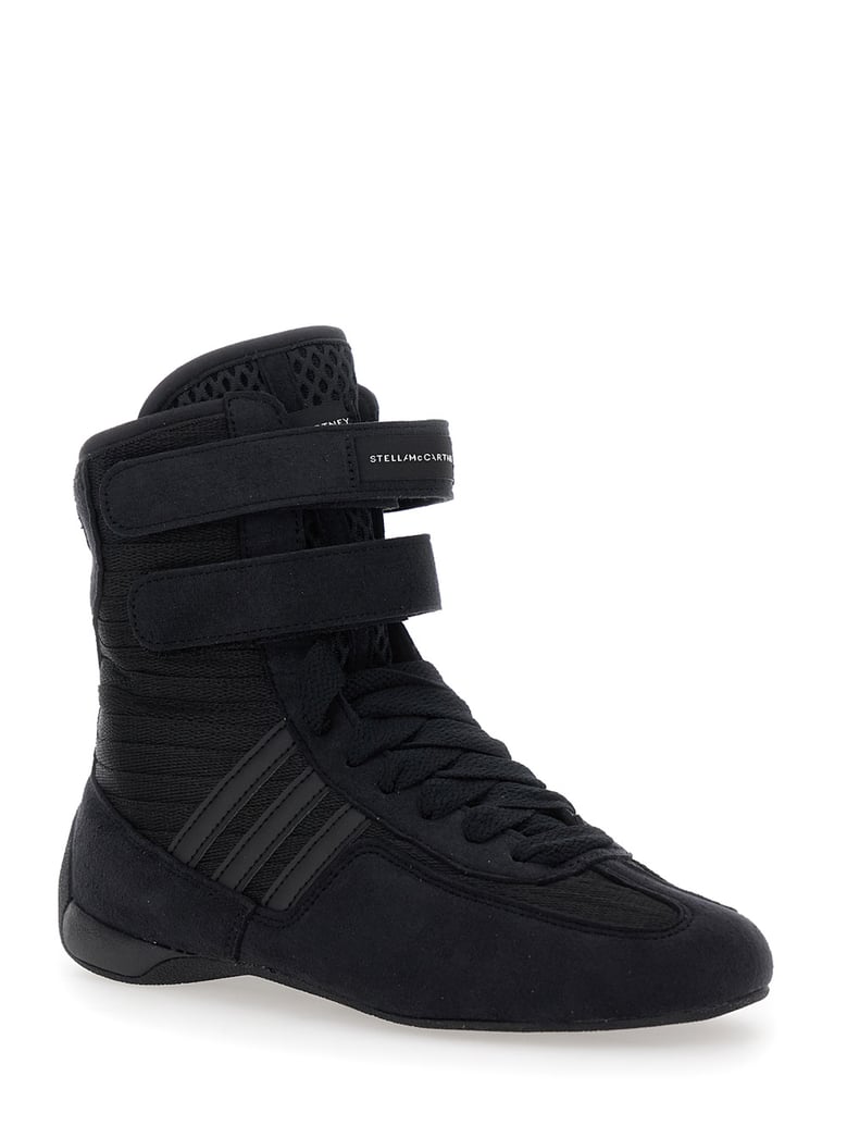 black sneakers with strap closure and logo detail by Selfnex
